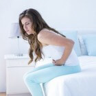 Buikpijn tijdens de zwangerschap: oorzaken van buikkrampen