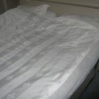 In bed slapen op een oude matras is niet gezond